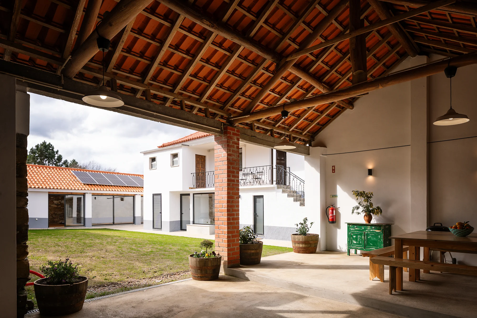 Wide courtyard view across Casa Chaouen and its outdoor living spaces